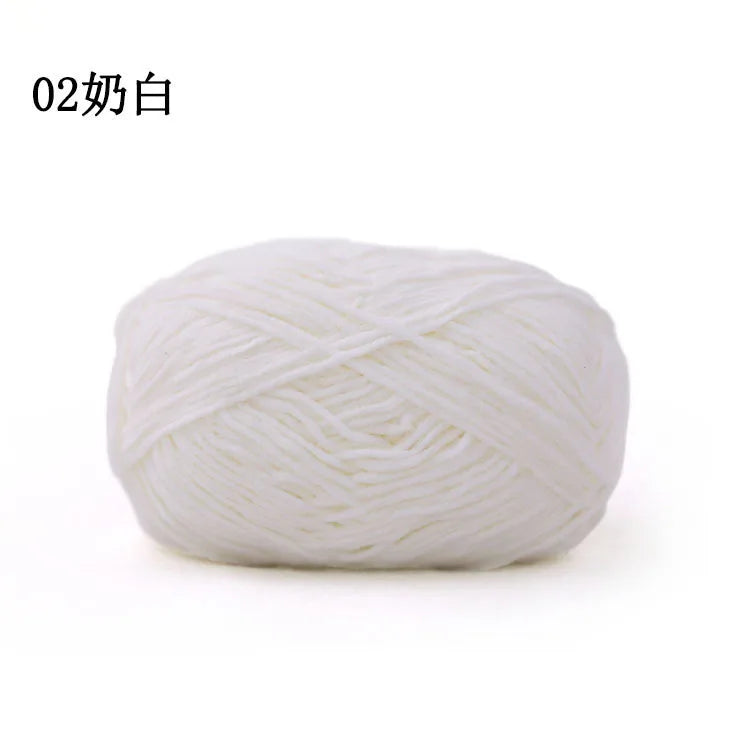 A ball of white 3mm matte chenille yarn for knitting and crochet.
