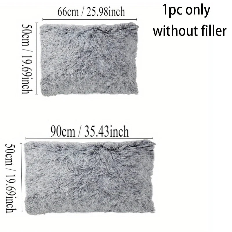 A gray faux fur pillow cover, 66cm by 50cm, shown without a filler.