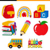 A set of iron-on decorative patches featuring letters A, B, and C, an apple, and a school bus graphic.