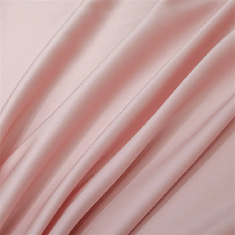 Soft pink luxury bamboo flat sheets draped and flowing
