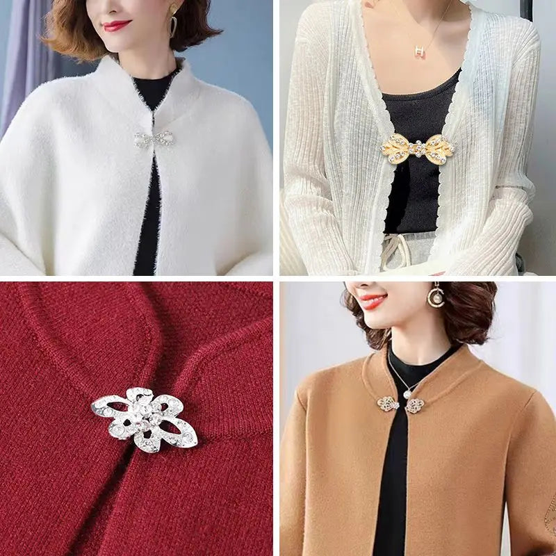 Close-up of elegant rhinestone clothing clips used to fasten scarves on knit sweaters and shirts.
