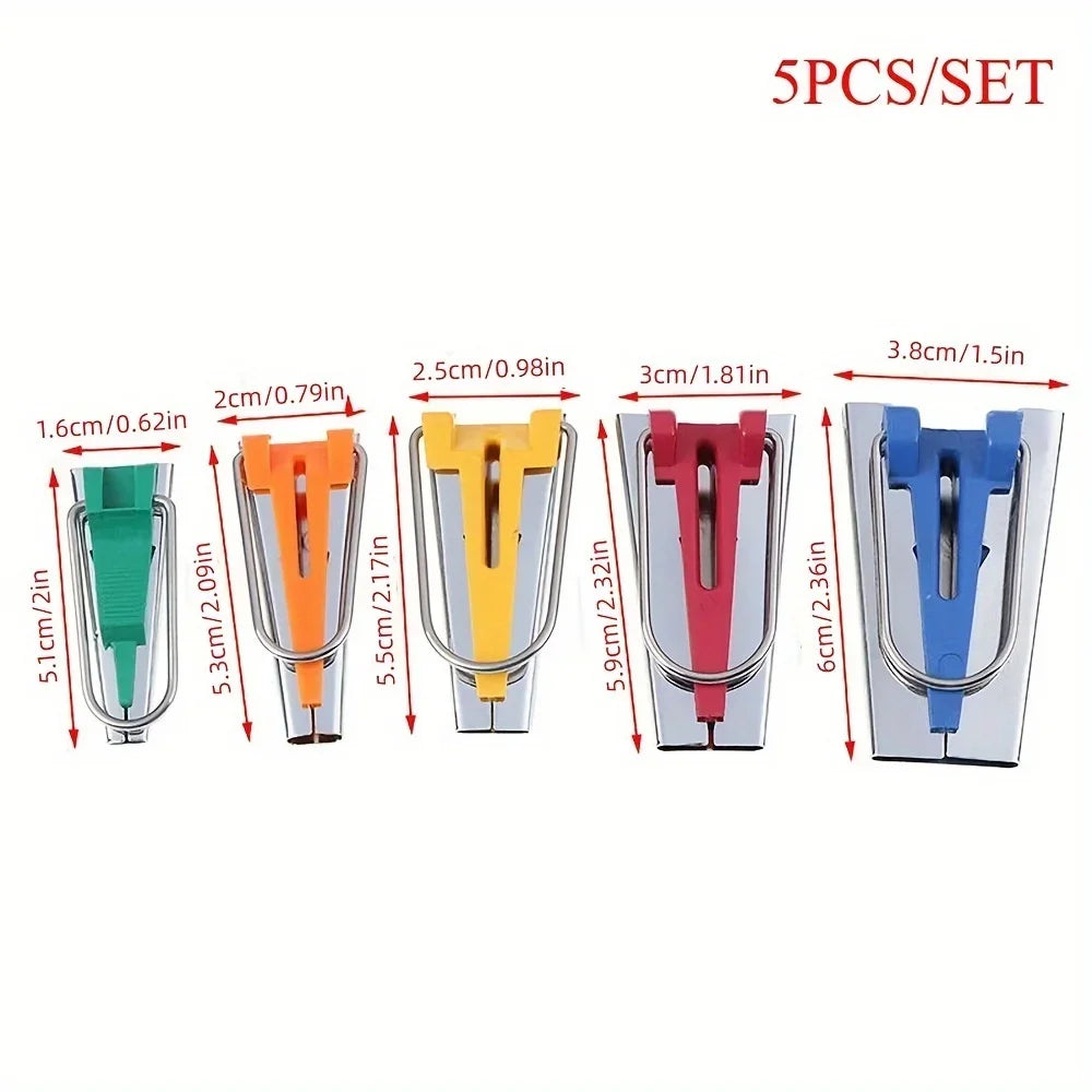 A set of five bias tape makers with various colors and an awl tool for sewing and quilting.