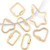 Several gold stainless steel heart-shaped screw lock carabiner clasps for jewelry making