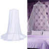 A sheer white dome mosquito net draped over a bed, providing protection for home use.