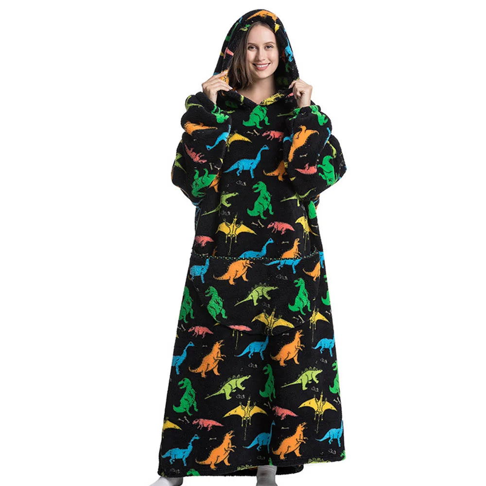 A woman models a black hoodie with a hood featuring a colorful dinosaur print.