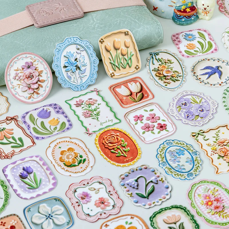 A collection of vintage botanical flower stickers in various colors and styles for journaling and scrapbooking