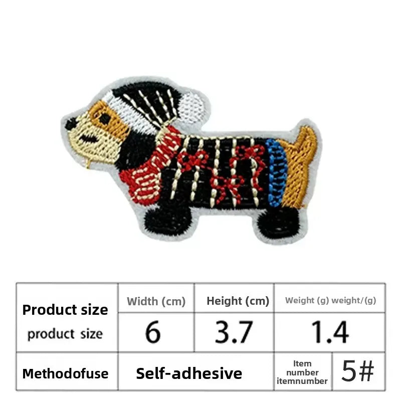 An embroidered patch of a dog face with black and white fur and colorful accents.