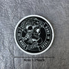 Black and white circular patch featuring a skull wearing a helmet with text that reads It Gets Worse Hang In There
