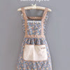 Korean version cute canvas apron featuring a floral pattern and adjustable straps.