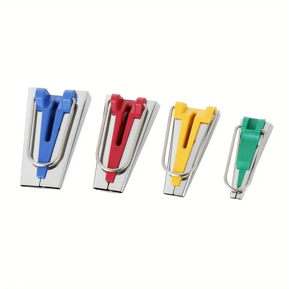 A set of four bias tape makers with various colored handles and awl tools for sewing and quilting.