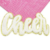 Gold glitter embroidered cheer letter patch on a pink cutting mat