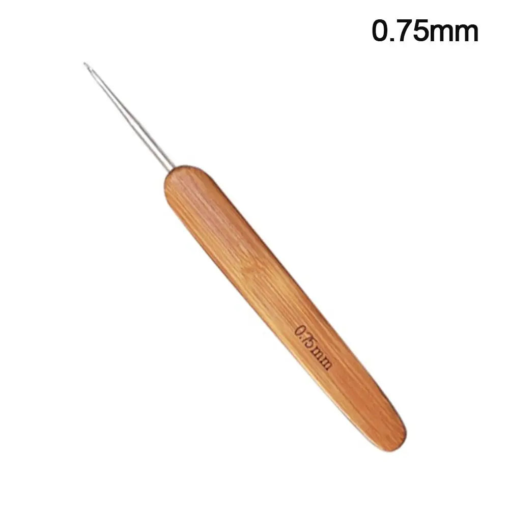 A pair of wooden crochet and knitting needles with a 0.75mm size marking.