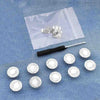 Silver metal button pins are displayed on a translucent bag with a black tool.