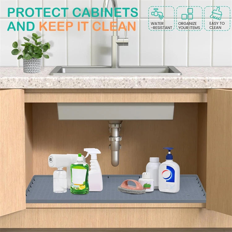 Silicone under sink drain mat for kitchen and bathroom placed in a cabinet