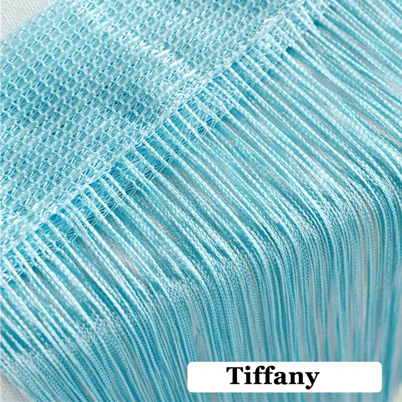 Close-up of light blue thread curtain tie-back fabric showing a woven texture.