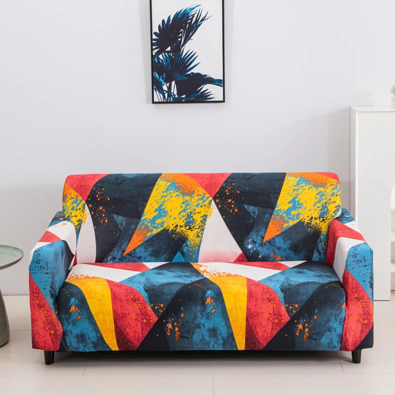 A vibrant stretch floral elastic sofa cover featuring a geometric pattern of blue, yellow, orange, and red colors.