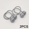 Two silver minimalist magnetic ball curtain tiebacks with coiled wire designs.