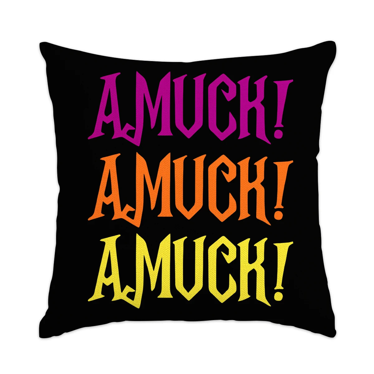 A black pillow with purple, orange, and yellow text that reads AMUCK!
