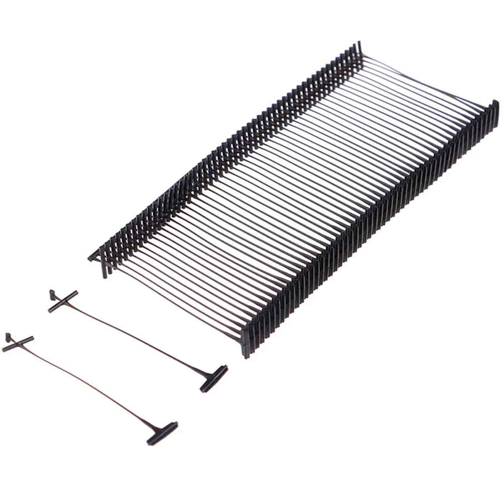 A black precision plastic tagging barbs for labels arranged in a linear, parallel structure.