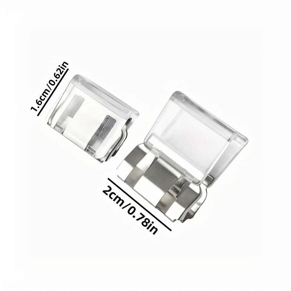 Clear plastic invisible pant hem clip with silver metal attachment for adjusting pant length.