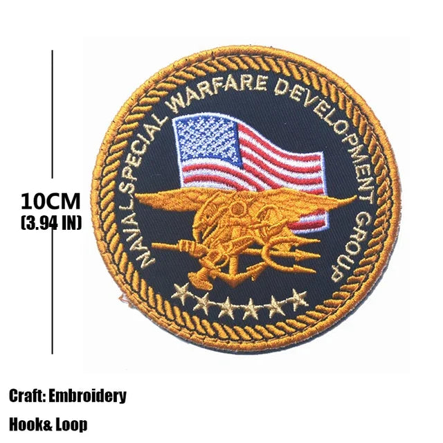 Embroidered patch for the Naval Special Warfare Development Group featuring an American flag and an eagle.