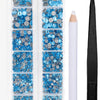 A clear plastic container holds a set of blue and silver crystal hot fix rhinestones with an applicator tool.