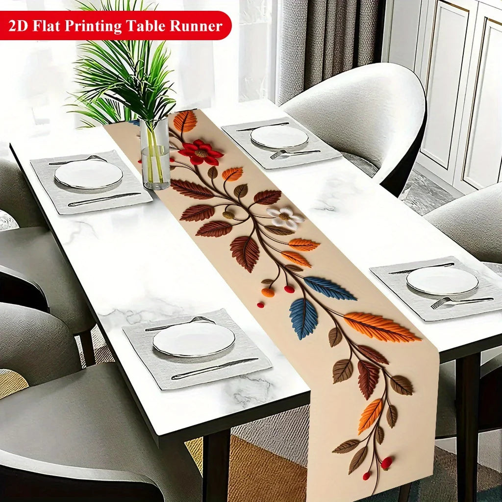 A beige floral branch table runner with leaves and berries is displayed on a white dining table set for a meal.