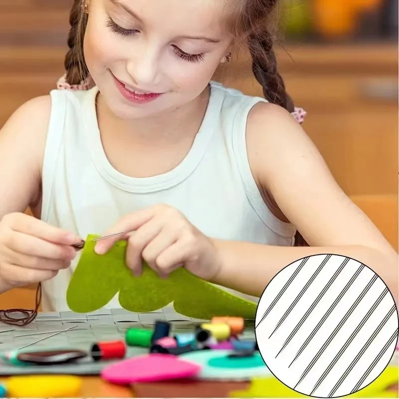 A young girl is using a stainless steel sewing needle to thread fabric for a craft project.