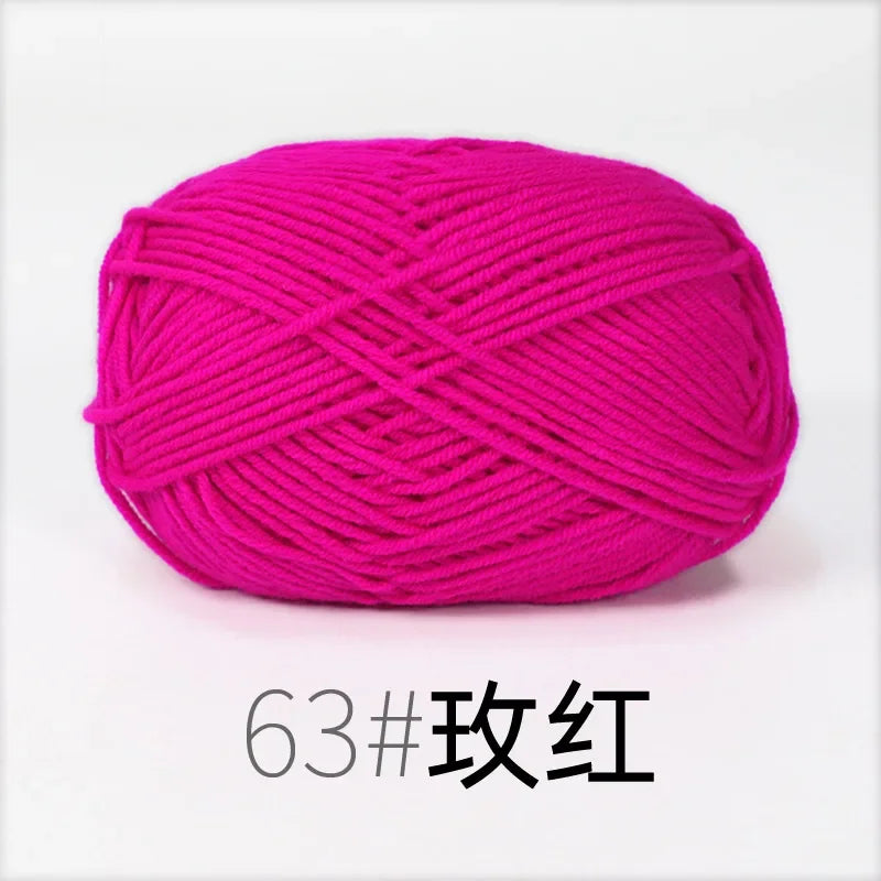 A ball of bright magenta knitting yarn used for crafts.