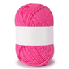 A skein of bright pink soft milk cotton knitting yarn rolled on a white label.