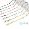A collection of delicate star and moon locket necklaces in various colors and lengths displayed on a white background.