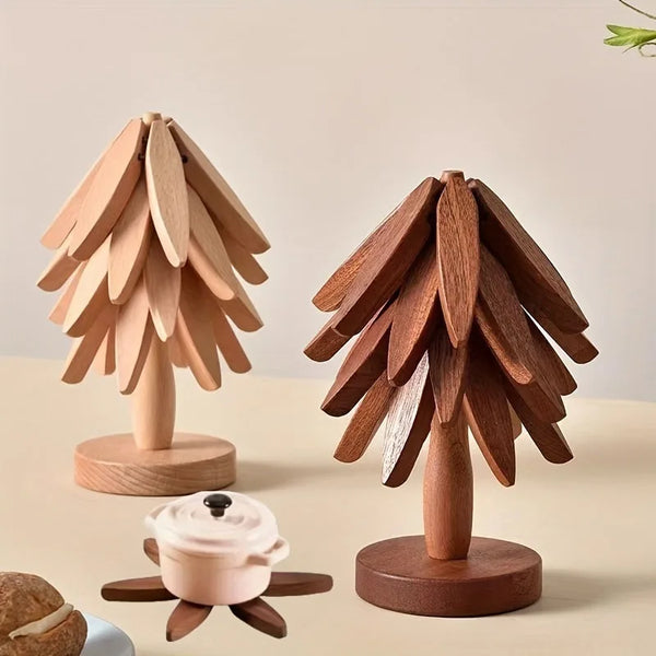 A wooden tree-shaped insulator used as a placemat or table protector.