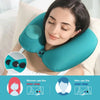 A woman is using a teal inflatable neck pillow, showing how women use the inner clasp and men use the outer clasp.