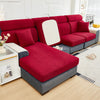 A deep red jacquard elastic sofa slipcover in a modern style with light gray accents and white cushions.