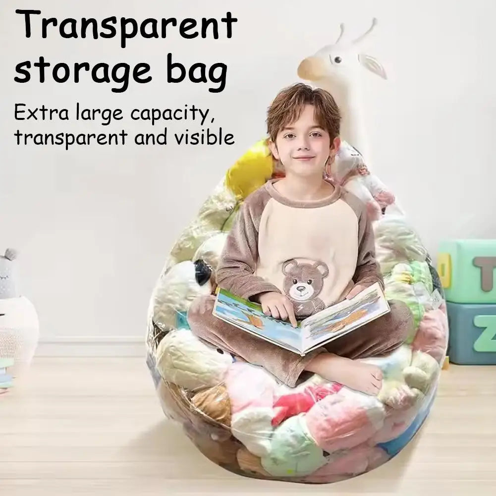 A boy is sitting inside a large, transparent storage bag filled with plush toys.