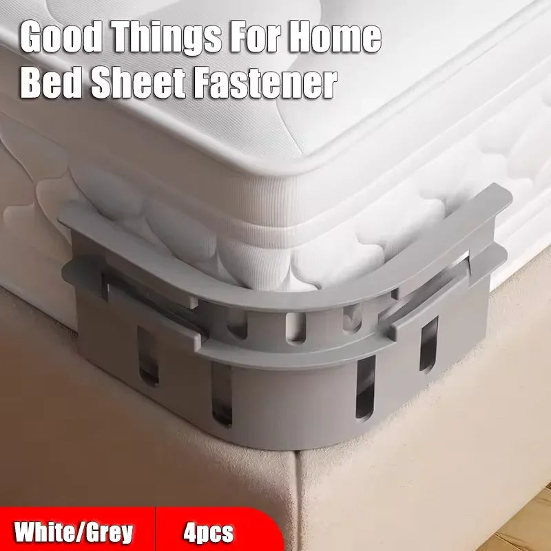 A close-up of white and grey non-slip bed sheet fasteners used to secure a bed sheet.