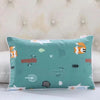 A teal cartoon style children's pillow featuring various animal and nature motifs.