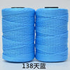 Two spools of bright blue hand knitting and crochet cord for crafting