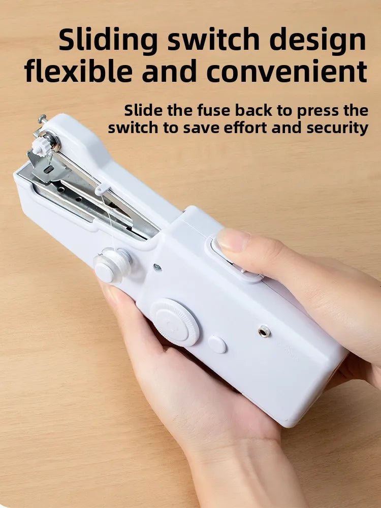 A hand is sliding a fuse back into a portable mini hand sewing machine to press the switch.