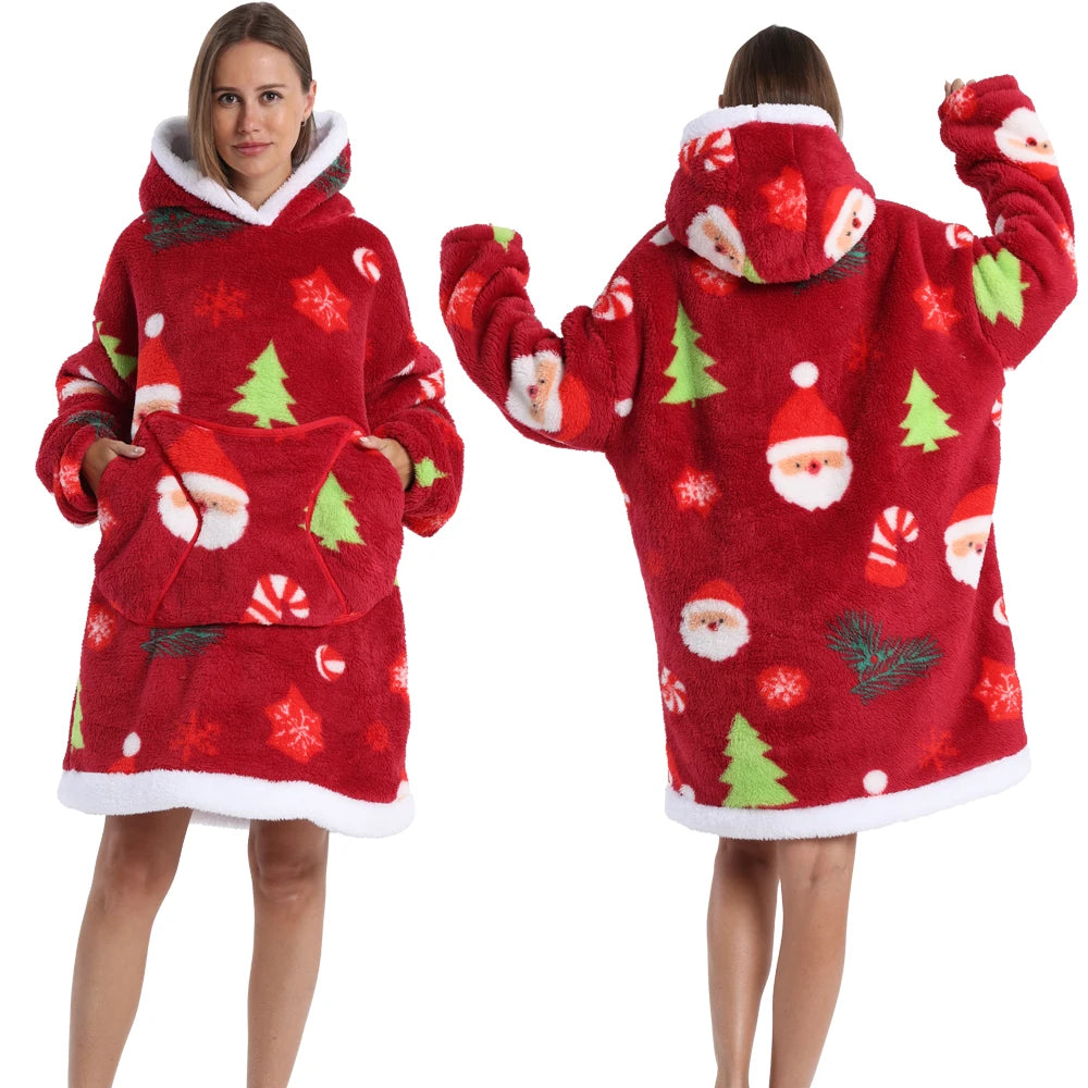 A woman models a red patchwork fleece hoodie with white trim and festive Christmas patterns.