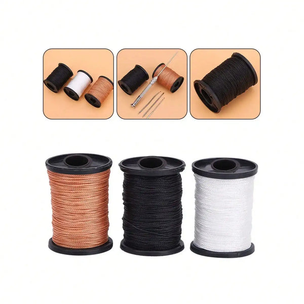 A set of black, white, and copper nylon sewing thread spools and a pair of scissors.