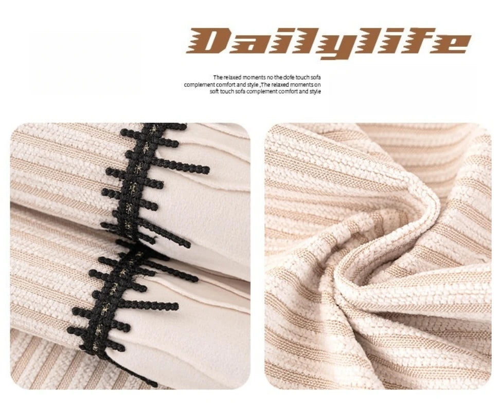 Close-up of a beige and cream striped chenille pleated sofa cover fabric showing texture and pleating detail.