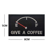 Black embroidered patch featuring an analog dial pointing to F and the text GIVE A COFFEE