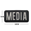 Black embroidered media patch with white text MEDIA and hook and loop backing