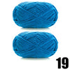 A ball of bright blue thick velvet yarn shown from the front.