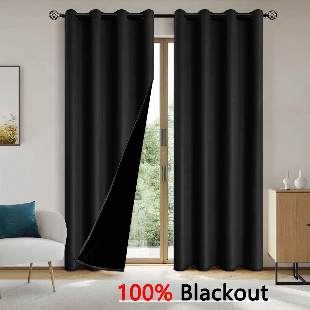 Solid black blackout curtains hanging in a doorway, ready for use.