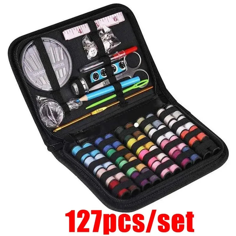 A black mini sewing kit set containing various hand sewing tools and needles.