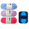 Three skeins of luminous glow-in-the-dark yarn in blue, purple, and pink stacked horizontally.