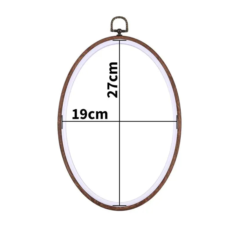 Round wooden embroidery hoop with a 19cm diameter and 27cm height.