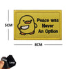 Yellow embroidered patch featuring a smiling yellow duck and the text Peace was Never An Option